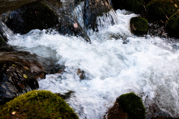 Natural water stream in Peruvian Andes. Fresh sweet water in Sacred Valley Peru. - Fotó, kép