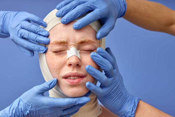 frightened woman with bandage on head before plastic surgery operation, afraid - Φωτογραφία, εικόνα