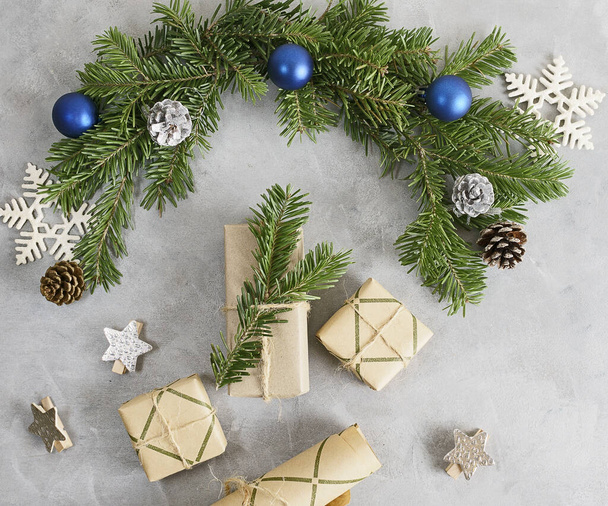 Top view flat lay christmas mockup with wrapped gifts in craft paper. Presents, holidays concept. - Φωτογραφία, εικόνα