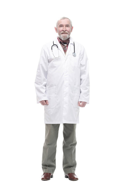 elderly competent doctor with a stethoscope. isolated on a white - Photo, Image