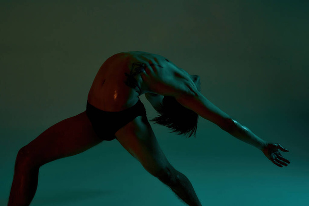 Young slim male dancer dancing ballet dance - Foto, immagini