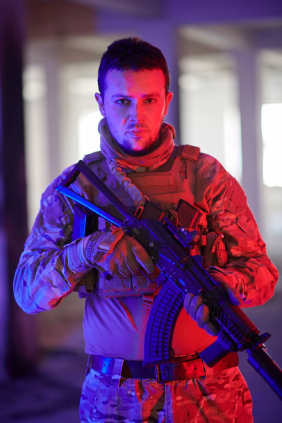 modern warfare soldier in urban environment portrait color lighti ng background - Φωτογραφία, εικόνα