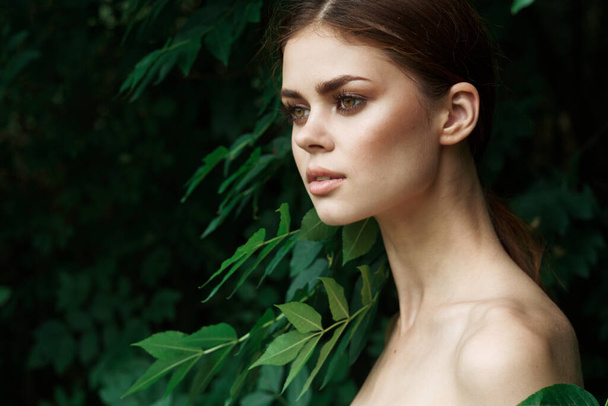 beautiful woman Cosmetology nature green leaves glamor model - Fotoğraf, Görsel