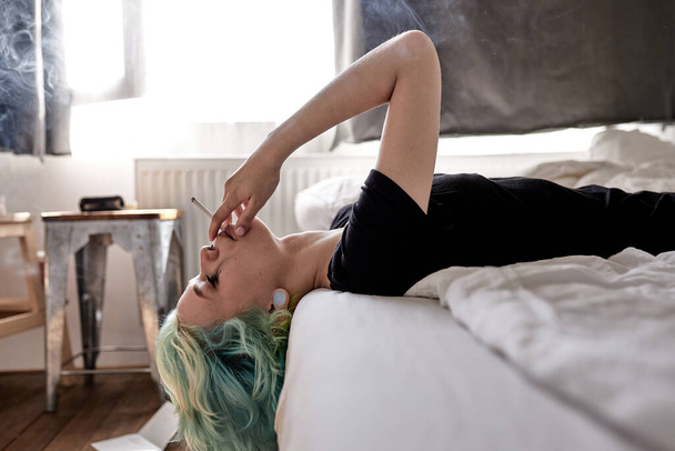 Caucasian female sad from love, smoking because of stress after breaking with boyfriend - Φωτογραφία, εικόνα