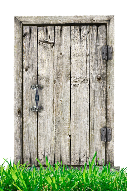 Drzwi drewniane z trawą izolowane na białym tle. - Zdjęcie, obraz