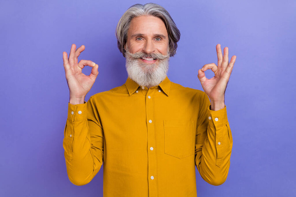 Photo of aged cheerful man promoter show okey symbol decide perfect great isolated over purple color background - Φωτογραφία, εικόνα