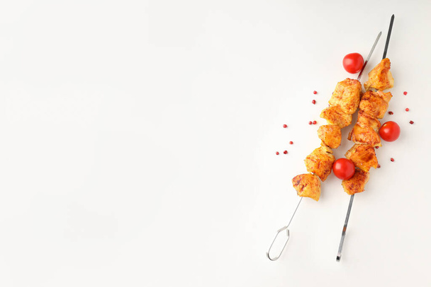 Concept of tasty food with chicken shashlik on white background - Fotoğraf, Görsel