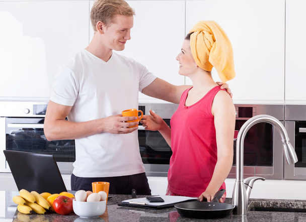 Couple during breakfast in the kitchen - Zdjęcie, obraz