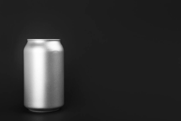 Can of energy drink on black background. Space for text - Фото, изображение