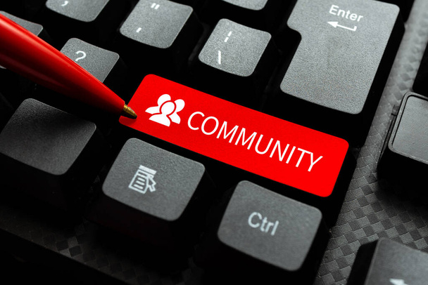 Sign displaying Community. Concept meaning group of showing with a common characteristics living together Typing Image Descriptions And Keywords, Entering New Internet Website - Photo, Image