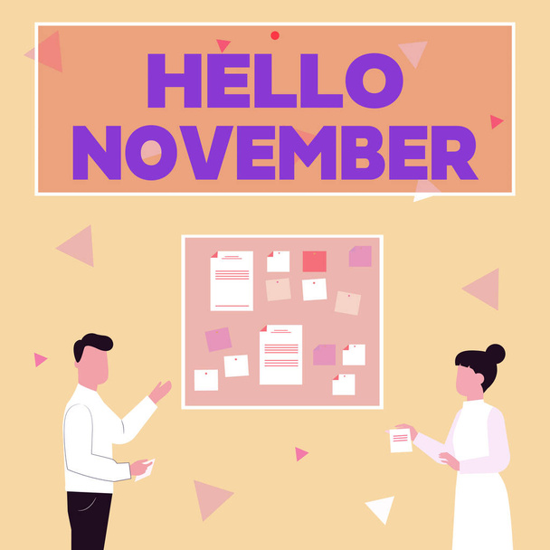 Handwriting text Hello November. Business showcase greeting used when welcoming the eleventh month of the year Illustration Of Couple Presenting Ideas Holding Notes Sticking On Boards. - Photo, Image