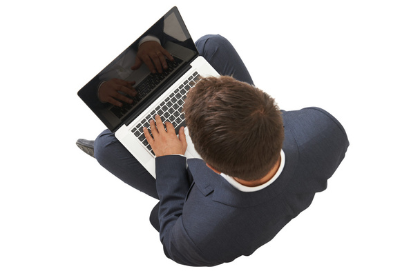 man in black suit with laptop - Photo, Image