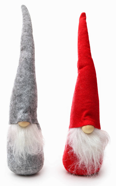 Two different color Santa clauses over white background - Photo, Image