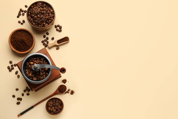 Flat lay composition with ground coffee and roasted beans on beige background, space for text - Photo, Image