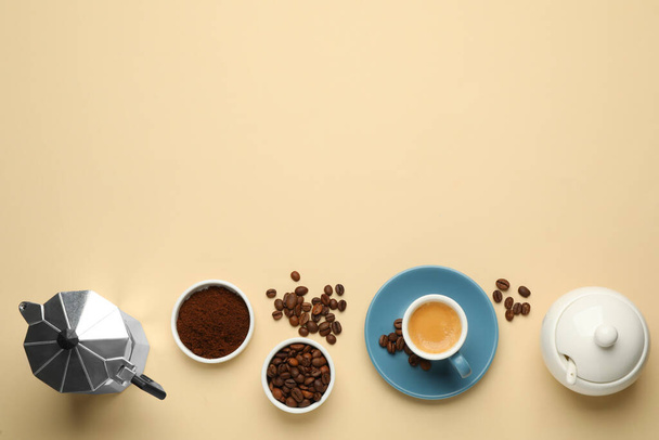Flat lay composition with espresso, ground coffee and roasted beans on beige background, space for text - Foto, Bild