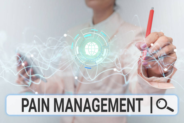 Inspiration showing sign Pain Management. Business approach a branch of medicine employing an interdisciplinary approach Lady In Uniform Using Futuristic Mobile Holographic Display Screen. - Photo, Image