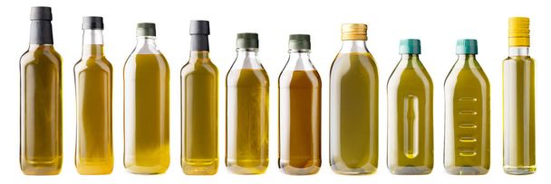 Row of olive oil bottles isolated on white - 写真・画像