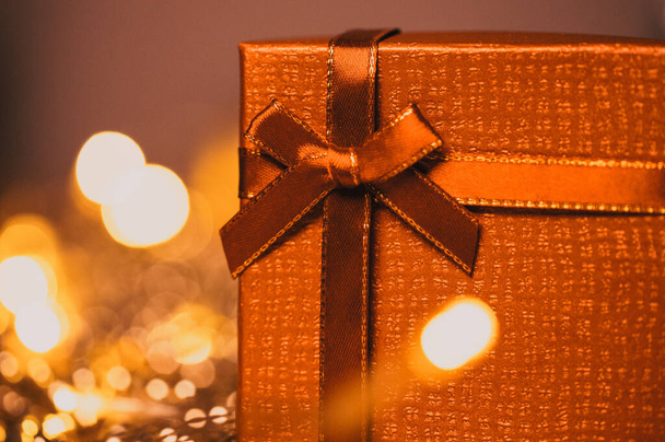 red gift boxes and holiday Christmas lights - Valokuva, kuva