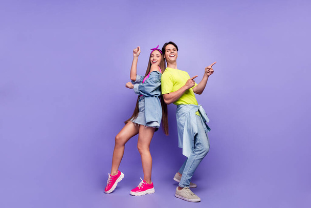 Photo of carefree funny couple dance disco retro event empty space wear pin-up outfit isolated violet color background - Photo, image