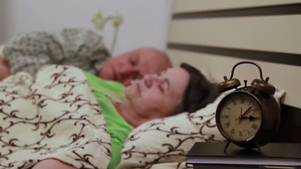 Mature couple in bed sleeping - Imágenes, Vídeo