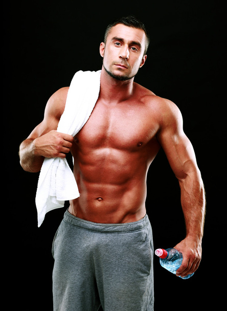 Handsome muscular man isolated - Foto, imagen
