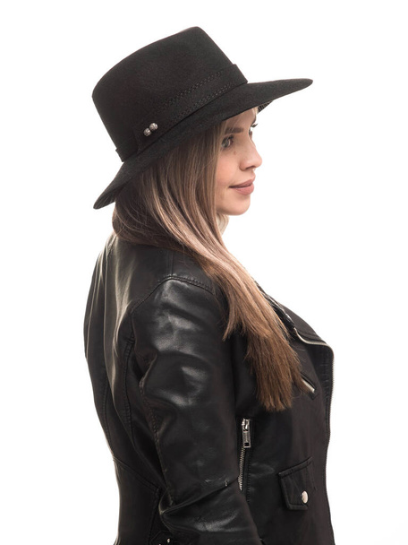 Woman in black felt hat and leather jacket - Foto, imagen
