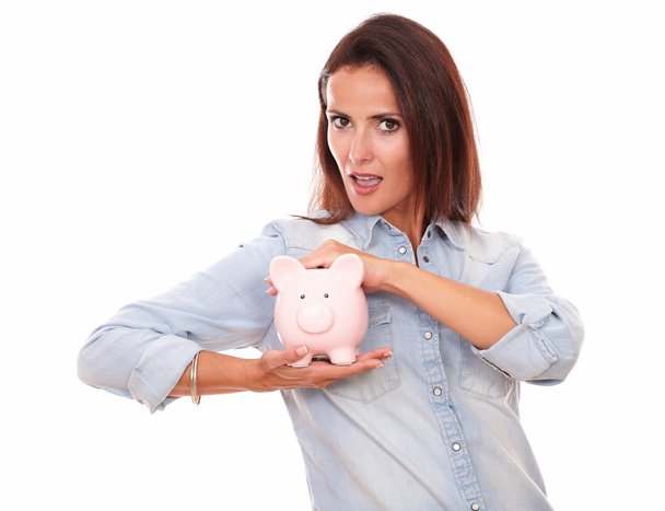 Attractive young lady with her piggybank - Foto, Bild