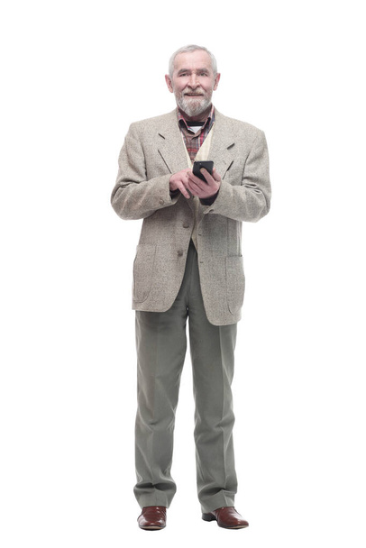 elderly businessman with a smartphone. isolated on a white - Φωτογραφία, εικόνα