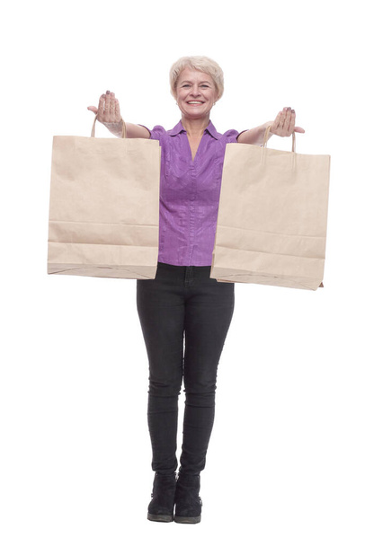 in full growth. smiling casual woman with shopping bags. - Foto, afbeelding