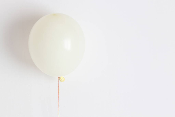 Light balloon. Light festive, joyful balloon on a string.  - Fotoğraf, Görsel