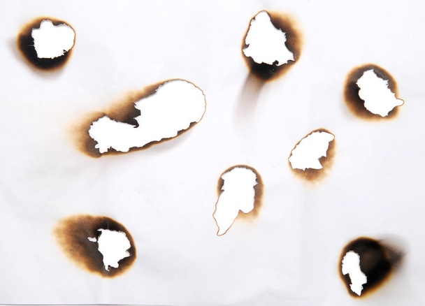 Burnt holes - Foto, Bild