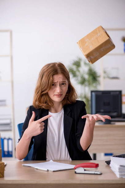 Young woman working in box delivery service - Photo, Image