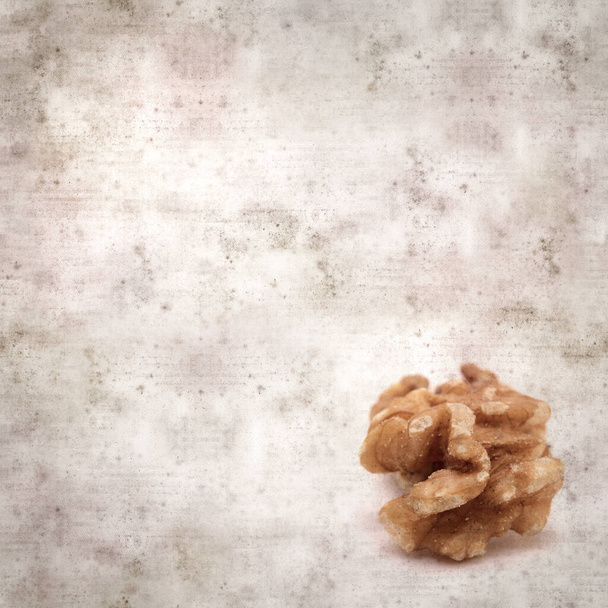 square stylish old textured paper background with walnuts from Gran Canaria - Fotó, kép