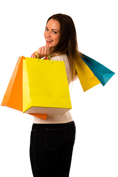 Preety young woman with colorful shopping bags isolated over whi - Photo, Image