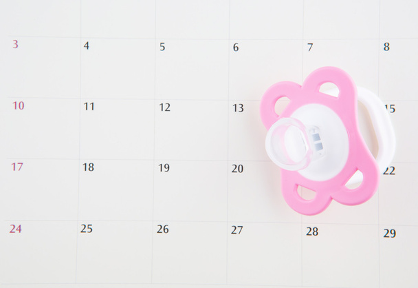 Pink Pacifier And Calendar - Photo, Image