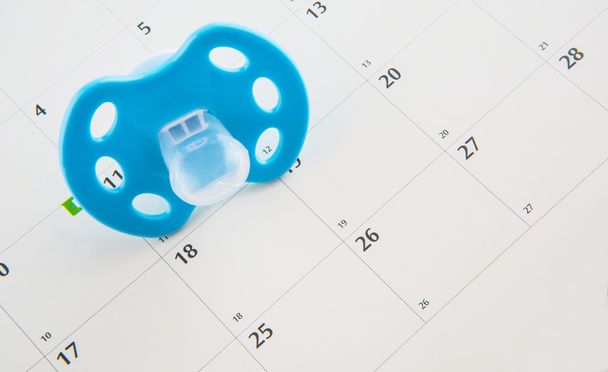 niebieski smoczka i kalendarz - Zdjęcie, obraz