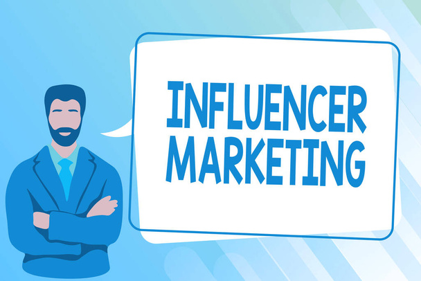 Hand writing sign Influencer Marketing. Business concept Endorser who Influence Potential Target Customers Man Crossing Hands Illustration Standing With Speech Bubble Message. - Photo, Image