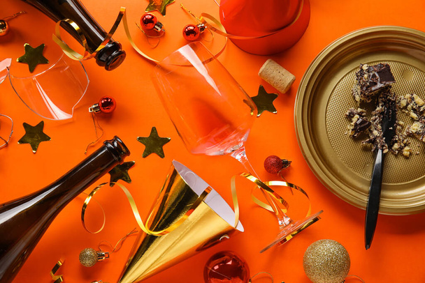 Composition of after party mess on color background. Christmas celebration - Photo, Image