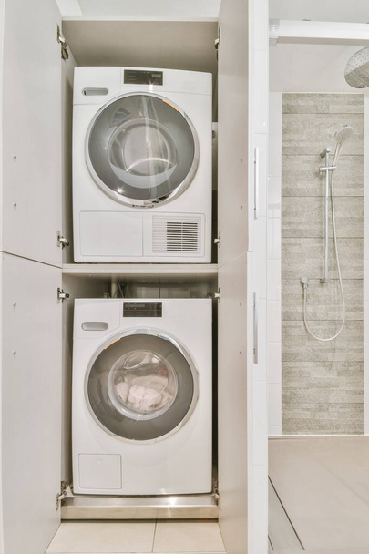 Laundry area with washer and dryer - Foto, Imagem