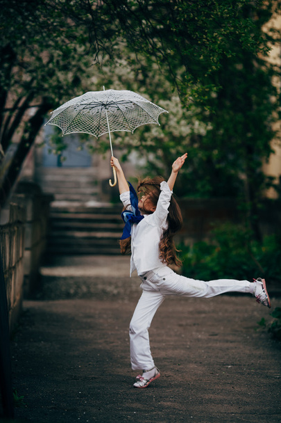 little girl dancing with lace ambrella - Foto, Imagen