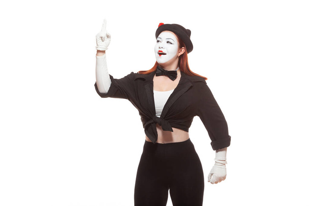 Portrait of a female mime artist performing, isolated on white background. Symbol of an idea, insight, Eureka - Fotó, kép