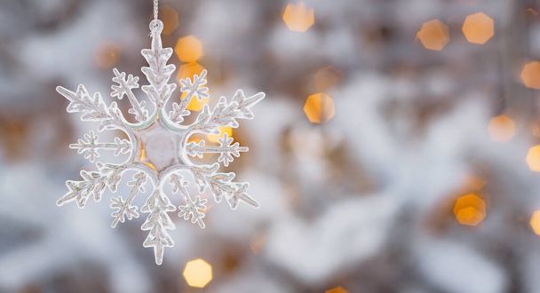 Winter snow background abstract bokeh. Snowflake Close-Up. Free space for text. Christmas, New Year. - Foto, Bild