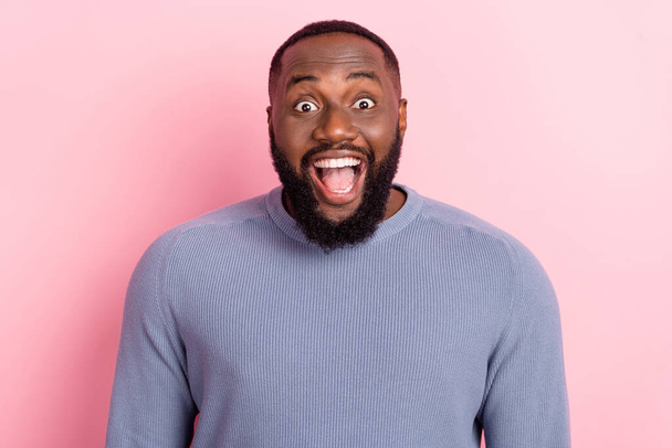 Photo of excited funky crazy bearded guy open mouth wow reaction wear grey pullover isolated pink color background - Foto, imagen