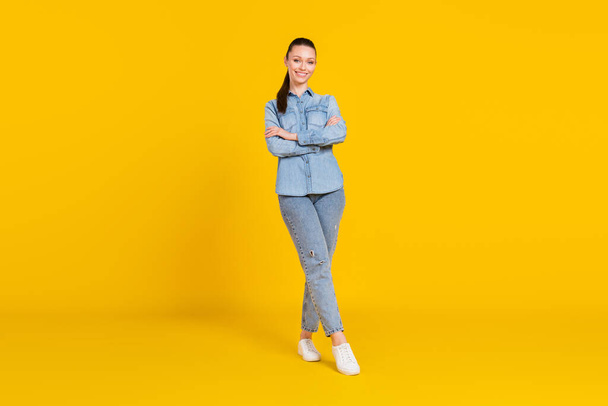 Full length body size photo woman smiling with crossed hands isolated vivid yellow color background - Фото, зображення
