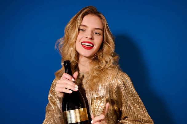Girl with champagne in playful mood - Zdjęcie, obraz