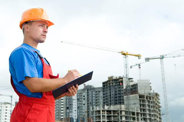 Builder inspector at construction area - Foto, imagen