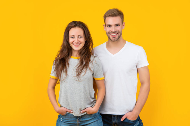 happy sexy young couple in love on yellow background, relationship - Fotó, kép