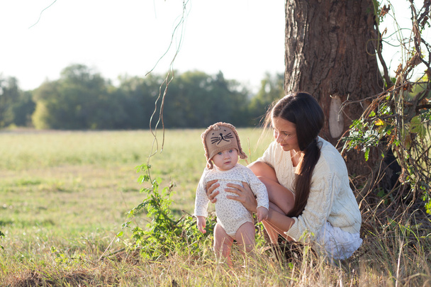 Mother and baby outdoors - Photo, Image