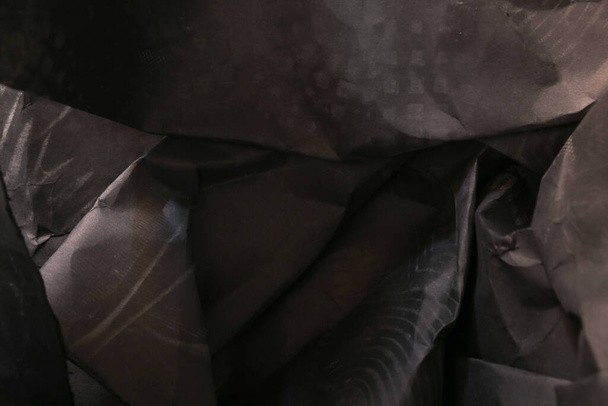 siyah buruşmuş kağıt arkaplan grunge doku arkaplanı - Fotoğraf, Görsel