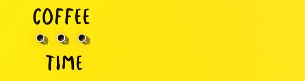 three white cups of coffee on yellow background. view from above. horizontal image. banner for insertion on site. 3D image. 3D rendering. - Photo, Image